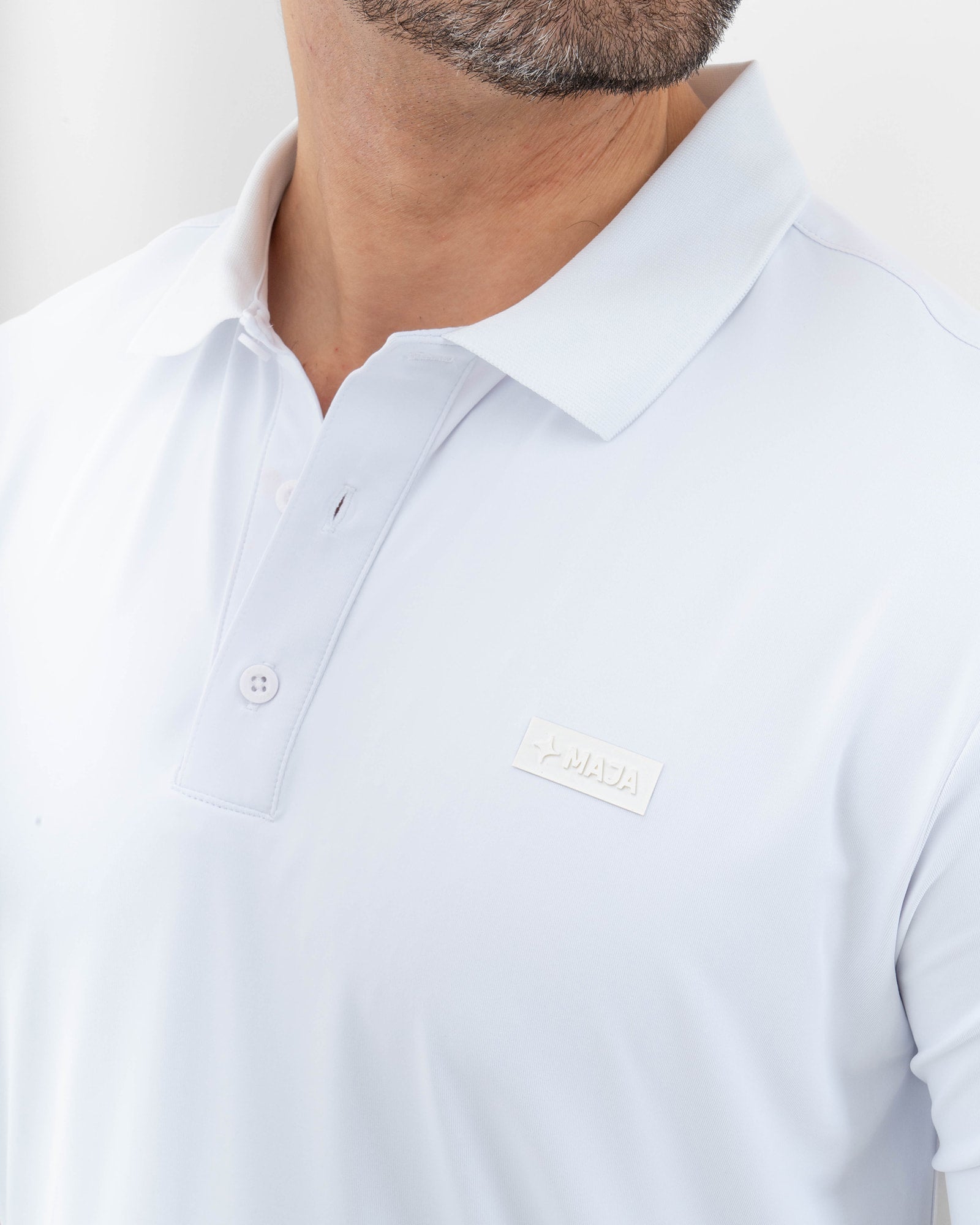 MAJA® Polo, Blanco, vista lateral, fit Regular, Poliéster, con Protección UV UPF50+, uso versátil